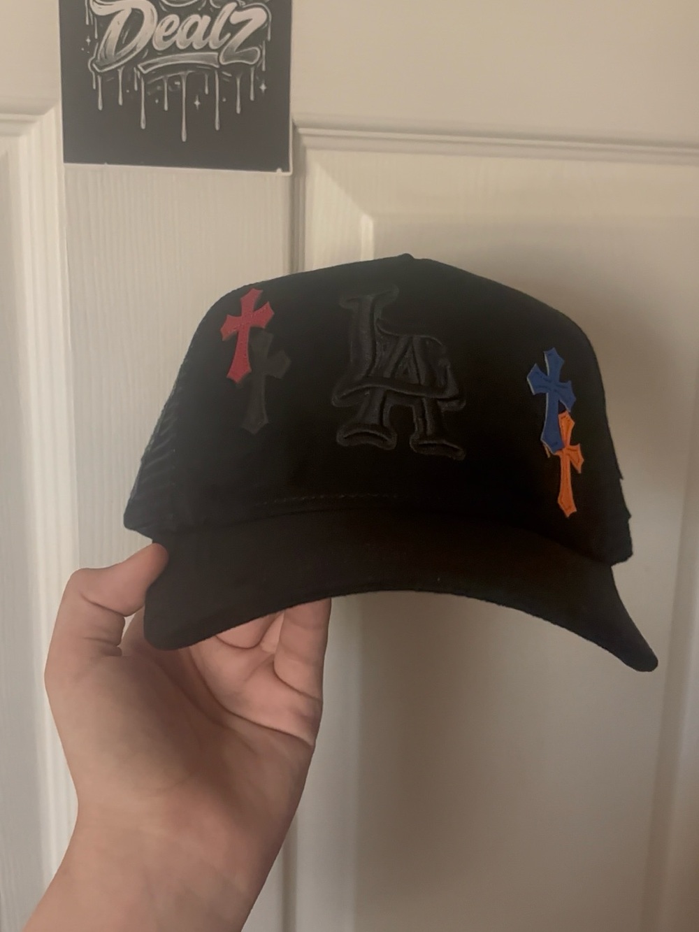Black LA Logo Trucker Cap with Multicolor Cross Accents Bankroll Hats